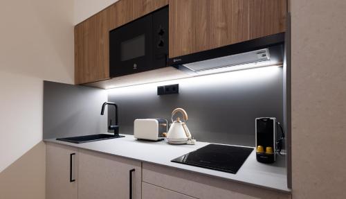 Η κουζίνα ή μικρή κουζίνα στο Stay U-nique Apartments Font BCN