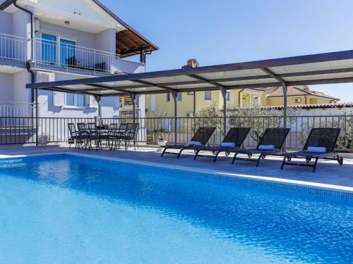 Πισίνα στο ή κοντά στο Apartment Tommy-1 by Interhome
