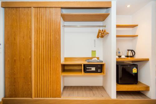 Una cocina o zona de cocina en Ayrest Hua Hin Hotel