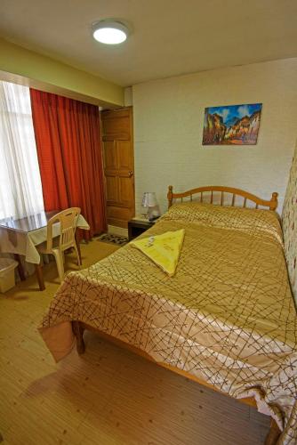 Un ou plusieurs lits dans un hébergement de l'établissement Hotel Virgen del Carmen - Huaraz
