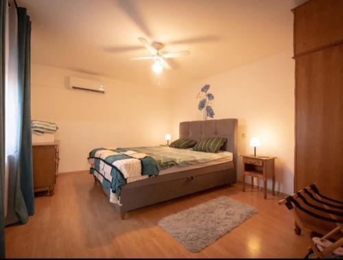 Postel nebo postele na pokoji v ubytování Apartman Kraljević