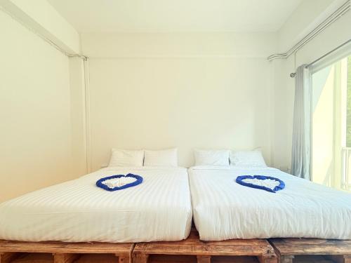Postel nebo postele na pokoji v ubytování Phak Phing Hostel