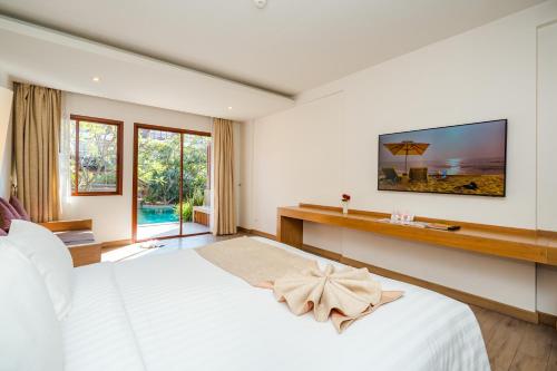 Cama o camas de una habitación en Ayrest Hua Hin Hotel