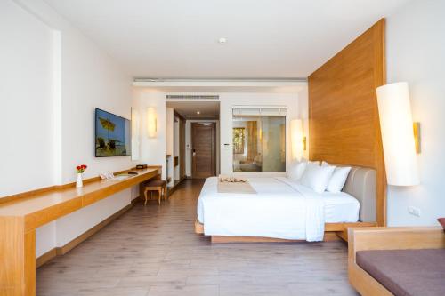Cama o camas de una habitación en Ayrest Hua Hin Hotel