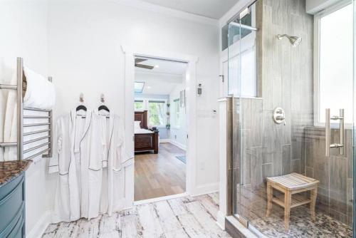 a bathroom with a shower and a walk in shower stall at Zen Mountainside Retreat - Spa & Amazing Views! Hot tub, Fire pit & Decks in Hagerstown