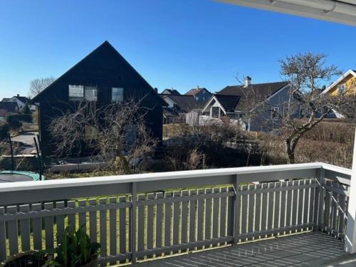 a view of a house from a balcony at Bright and central apartment in Stavanger