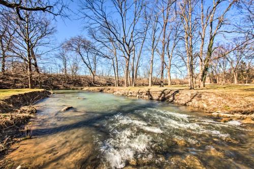 a river with snow on the ground and trees at Creek Access and Deck Runningwater Lancaster Gem in Lancaster