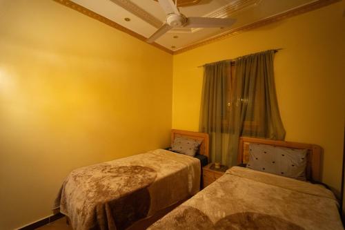 Oscar Apartment ! 11 !にあるベッド