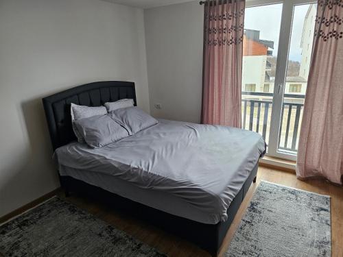 Ένα ή περισσότερα κρεβάτια σε δωμάτιο στο Kopaonik Alibi IRIS10