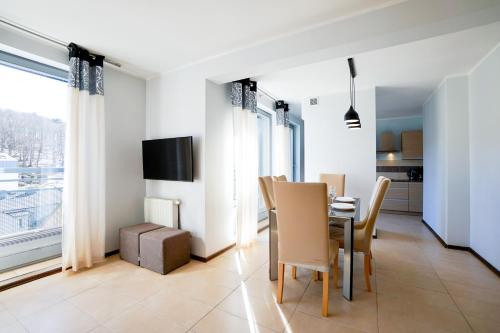 Televisyen dan/atau pusat hiburan di Marea by Baltic Home