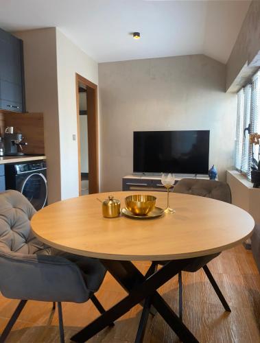 a table in a living room with two bowls on it at Djanina 3 in Sandanski