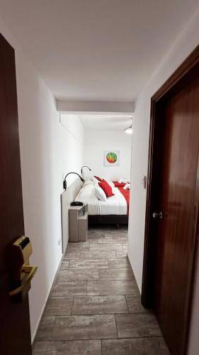 Postel nebo postele na pokoji v ubytování Gran Hotel Fontainebleau