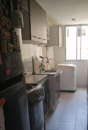 Η κουζίνα ή μικρή κουζίνα στο Departamento con bonita vista
