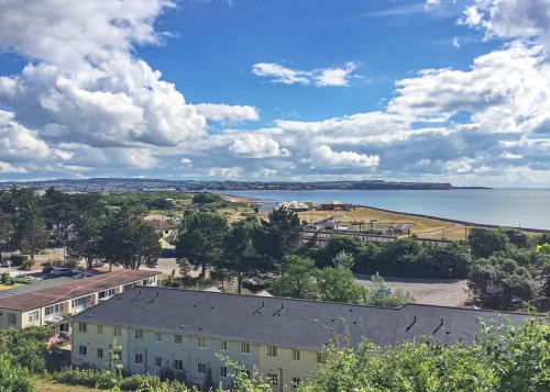 an aerial view of a building and a lake at Red Rock Apartments in Dawlish