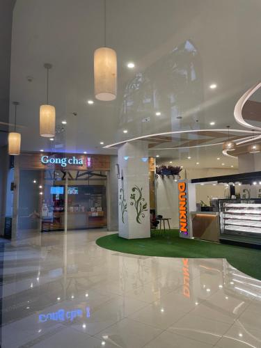 a store with a car on display in a building at NAIA Terminal 3 Condo Newport with WIFI Netflix Pool in Manila
