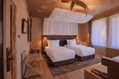 Avantgarde Refined Caves Of Cappadociaにあるベッド