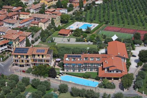 an aerial view of a resort with a swimming pool at Spa Hotel Splendid Sole in Manerba del Garda