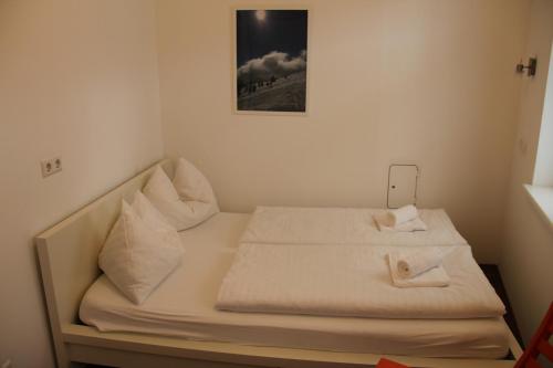 Postel nebo postele na pokoji v ubytování My Adventure Appartements Schladming by Schladmingurlaub