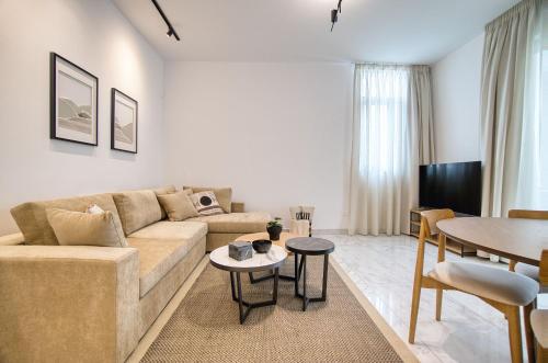 TV a/nebo společenská místnost v ubytování Prestige 103 1 BED