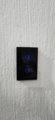 a picture of a blue light on a white blanket at Sandhurst Luxury Accommodation Self-Catering Suites in Pietermaritzburg in Pietermaritzburg