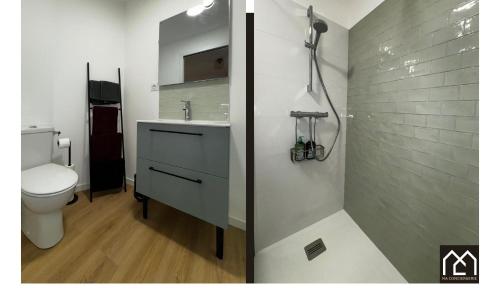 une salle de bain avec des toilettes blanches et un lavabo dans l'établissement La Maison de Clocheville - Appartements tout confort, à Boulogne-sur-Mer