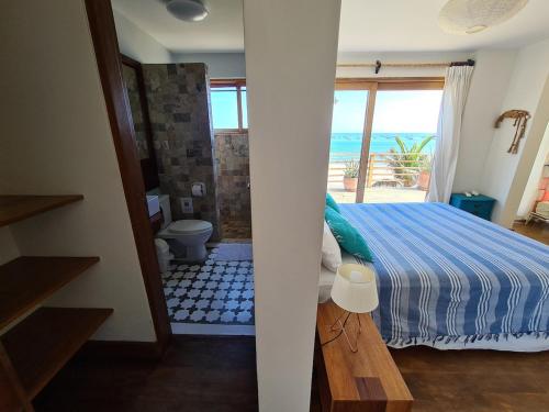 Postel nebo postele na pokoji v ubytování Casa Flamenco en la playa con piscina y playa, un paraíso!