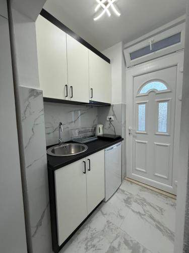 Kuchyň nebo kuchyňský kout v ubytování Apartement Igalo Center