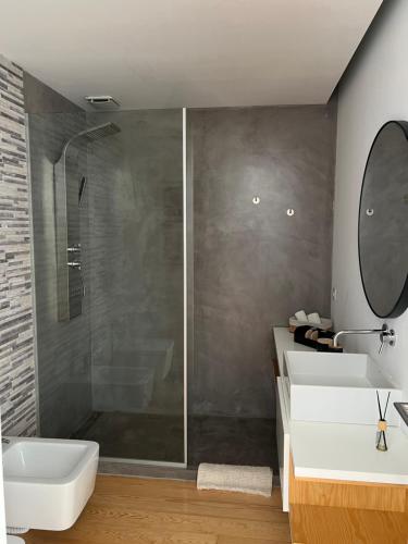 Phòng tắm tại Moradia Vila Golfe