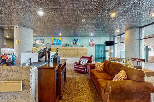 a living room with a couch and a table at Sugar Top 2524 in Sugar Mountain
