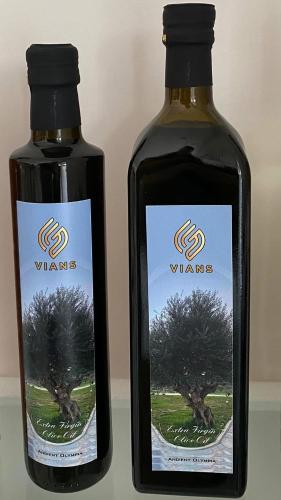 two bottles of wine sitting next to each other at Vians Olympia Resort in Olympia