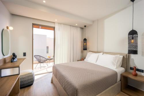 Postel nebo postele na pokoji v ubytování Stefi Villas - Deluxe Pool Bliss Retreats