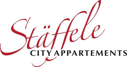 a sign for a city apartment with the words eight fifth city applications at Stäffele City Appartements in Stuttgart