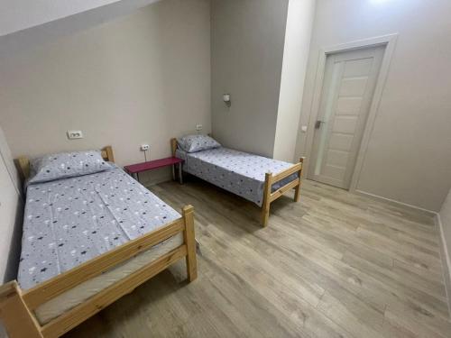 Postel nebo postele na pokoji v ubytování Hostel Vertum