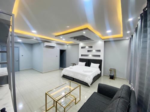 Postel nebo postele na pokoji v ubytování Carousel Hotel