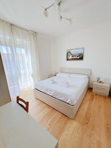 Кровать или кровати в номере Seveso Milan Central Rooms
