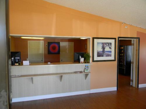 a lobby with a counter in a building at SleepWell Stockbridge in Stockbridge