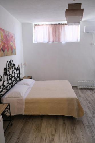 Letto o letti in una camera di Camere Dieci Maggio