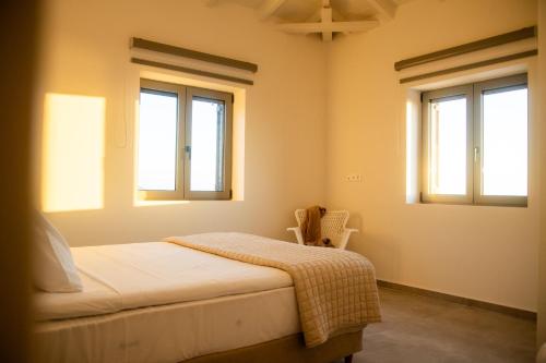 Katil atau katil-katil dalam bilik di Olive & Stone Residences