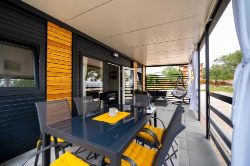 Cosy modern mini house 10 by the sea with private terrace in Limoni Camp - Walk to Beach & Local Taverns