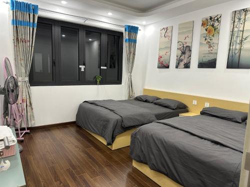 Кровать или кровати в номере Rose house
