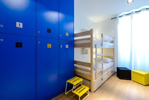 Μία ή περισσότερες κουκέτες σε δωμάτιο στο Hostel Sea Breeze