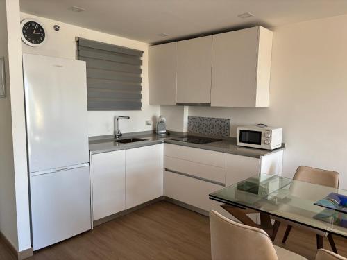 Η κουζίνα ή μικρή κουζίνα στο Apartamento Lilo