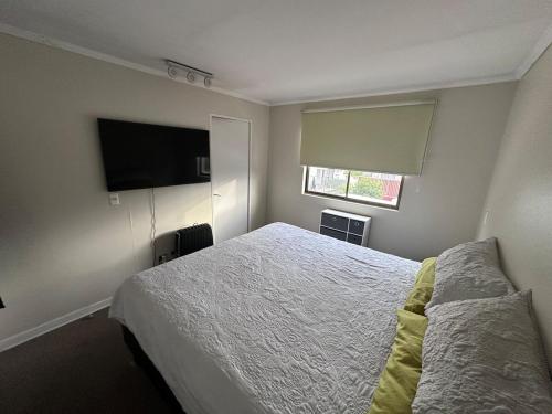 En eller flere senge i et værelse på Hermosa Casa en Colina