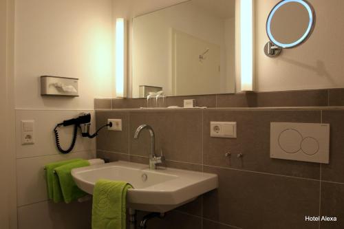 Koupelna v ubytování Hotel Alexa