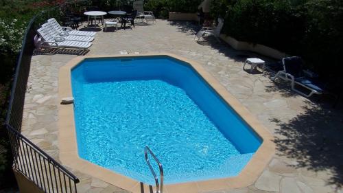 Photo de la galerie de l'établissement Les Tamaris 0233 villa, aux Issambres