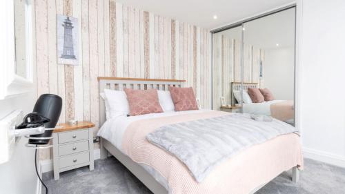 Ένα ή περισσότερα κρεβάτια σε δωμάτιο στο Pebble Beach