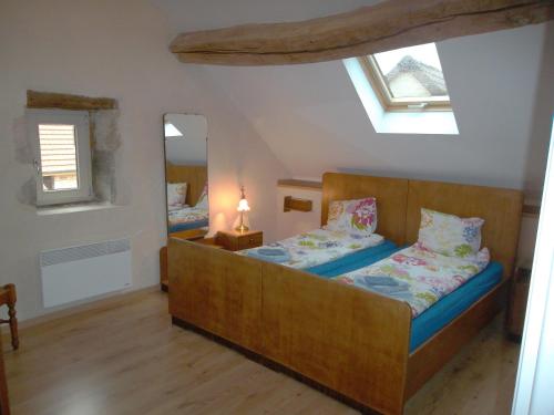Ένα ή περισσότερα κρεβάτια σε δωμάτιο στο Les Trois Croix