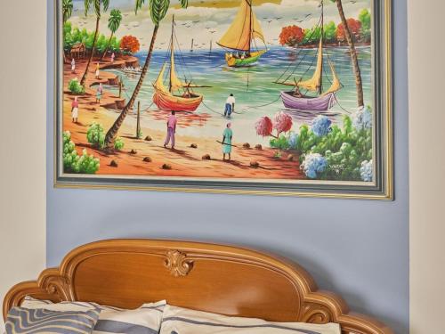 a painting of a beach with boats on the water at Casa Gianchi, a full immersion in nature in Pallanzeno