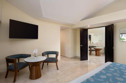 Télévision ou salle de divertissement dans l'établissement Impressive Premium Punta Cana - All Inclusive