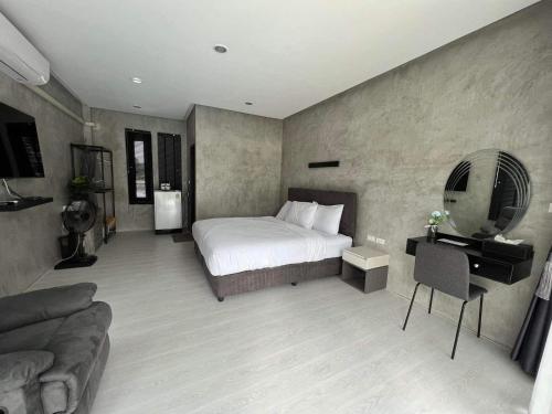 Postel nebo postele na pokoji v ubytování มาพูลวิลล่าขนอม MA Pool Villa Khanom 2